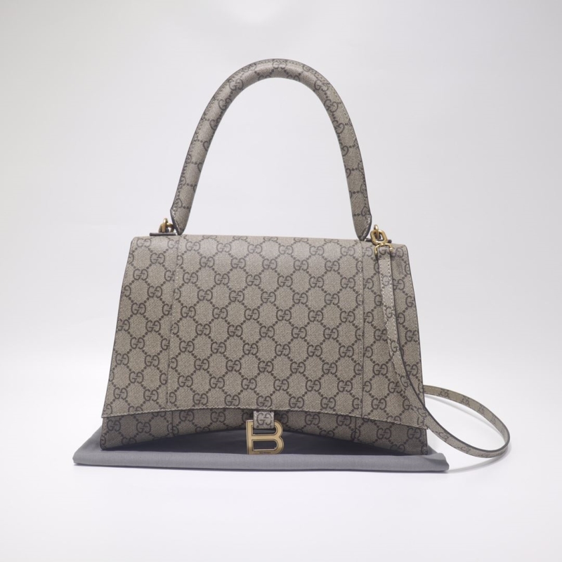 G*u*i top handle bags